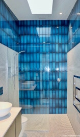 Bathroom ensuite with blue tiles